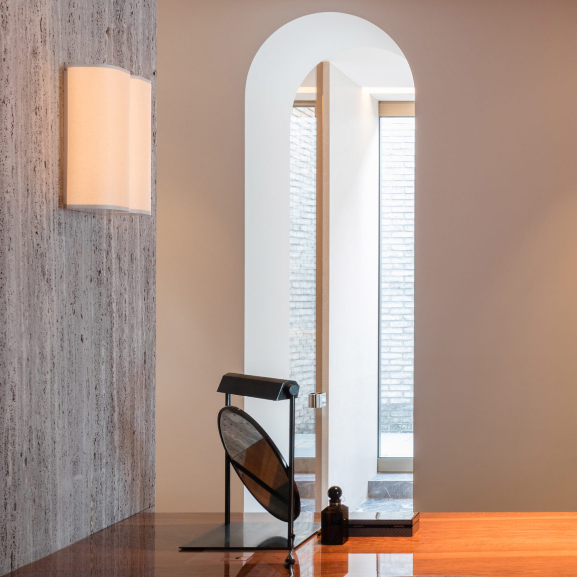 Brasilia A sconce by Michel Boyer for Ozone in a modern house