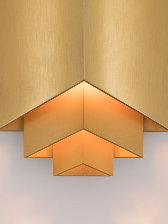Focus on the structure of the Phénix sconce designed by Joseph Dirand for Ozone