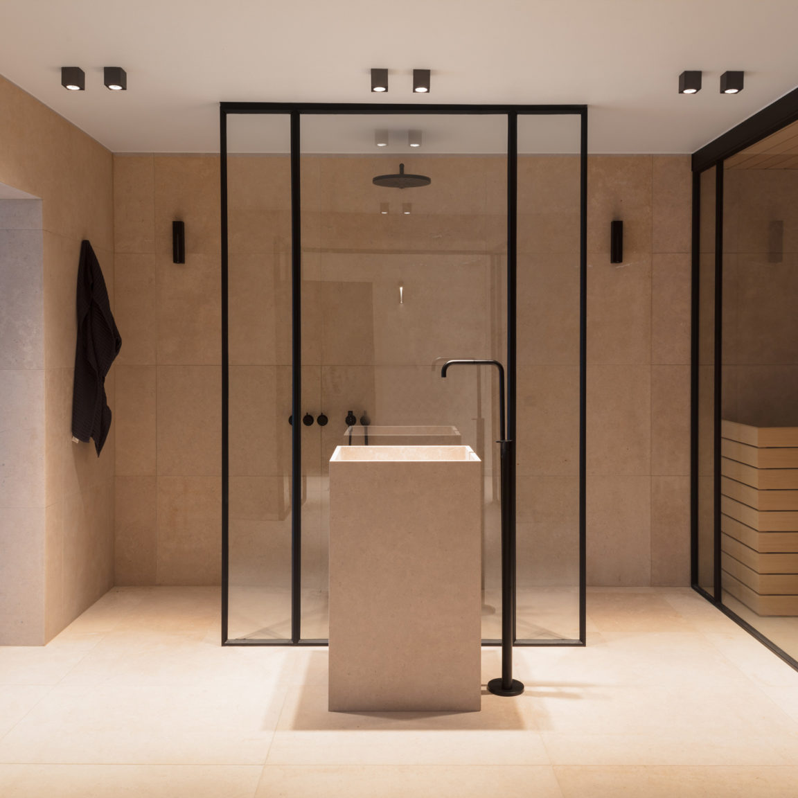 Black Marienbad S spotlights by Gounot & Jähnke in a beige bathroom with black details