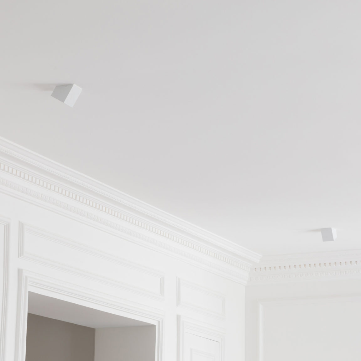 Marienbad S55 inclined spotlights by Gounot & Jähnke mounted on a white ceiling with moldings