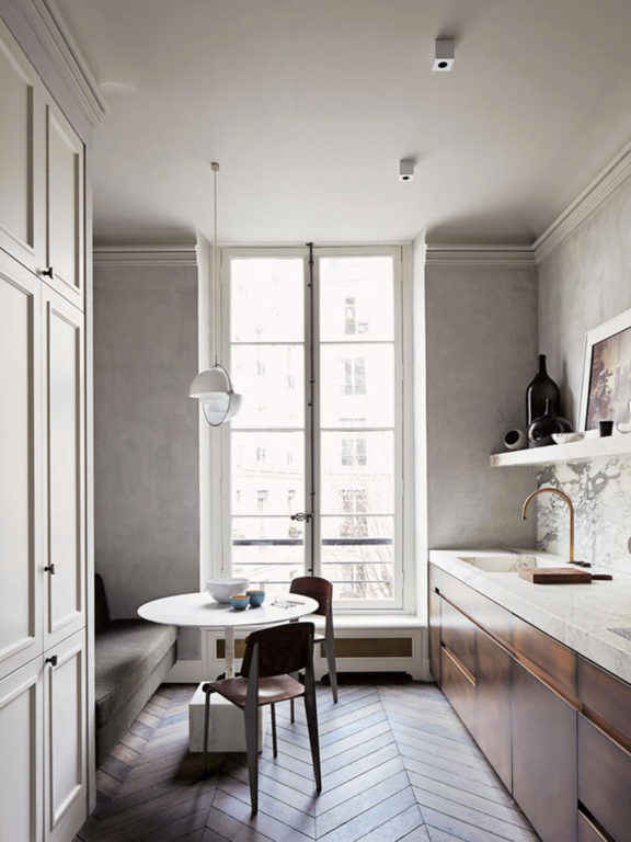 Marienbad S cube spotlights in the marble and polished concrete kitchen of an apartment