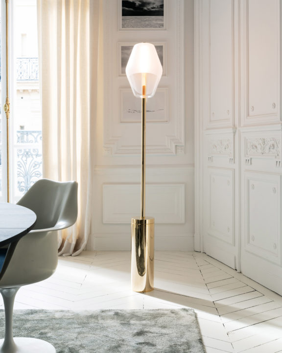 Régis Botta's Montmartre street lamp in front of a white wall with moldings