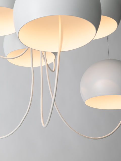 Focus on the white spheres of the Paulin M101 chandelier