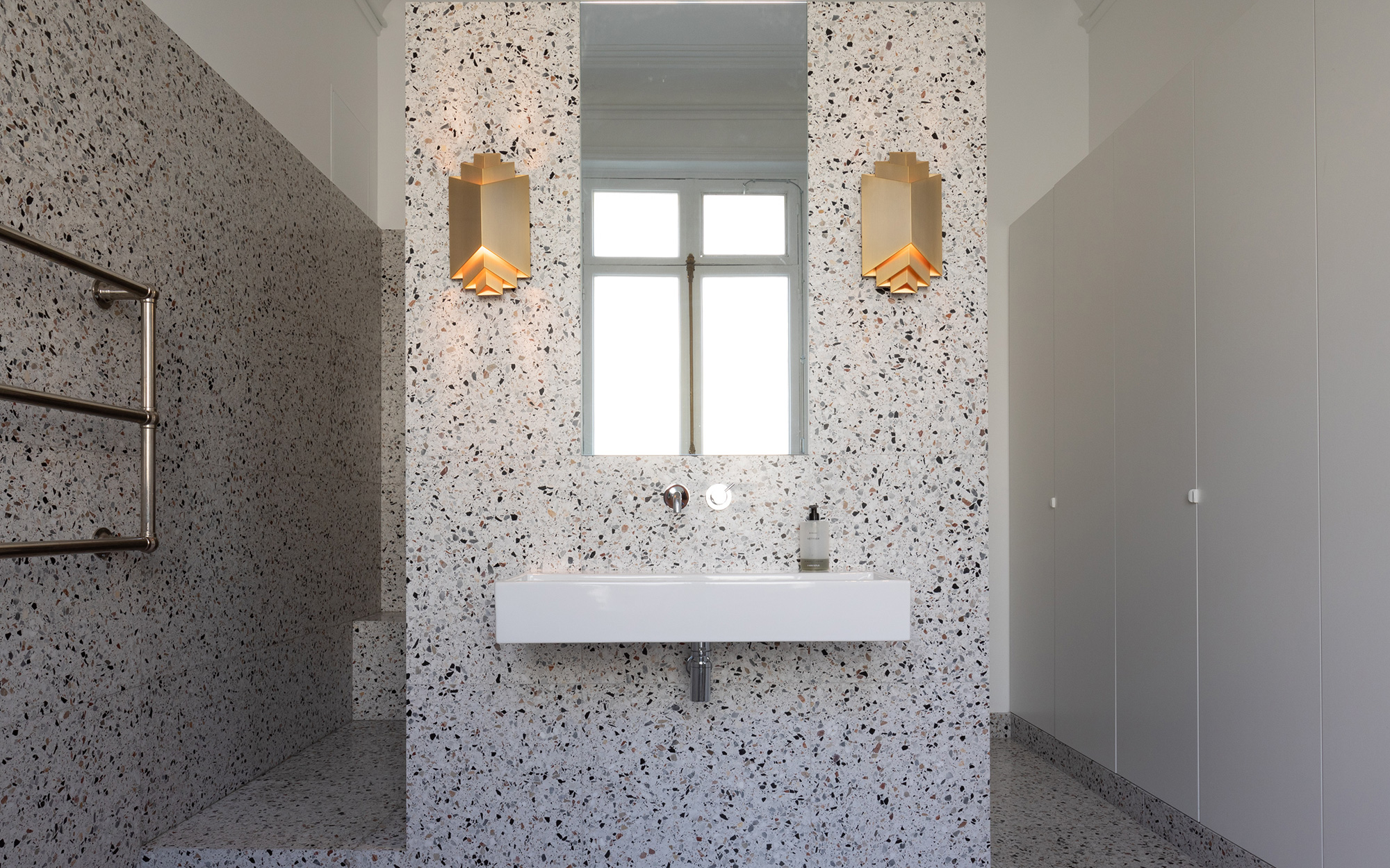 Phenix wall lights in the Appartement Lumière bathroom.