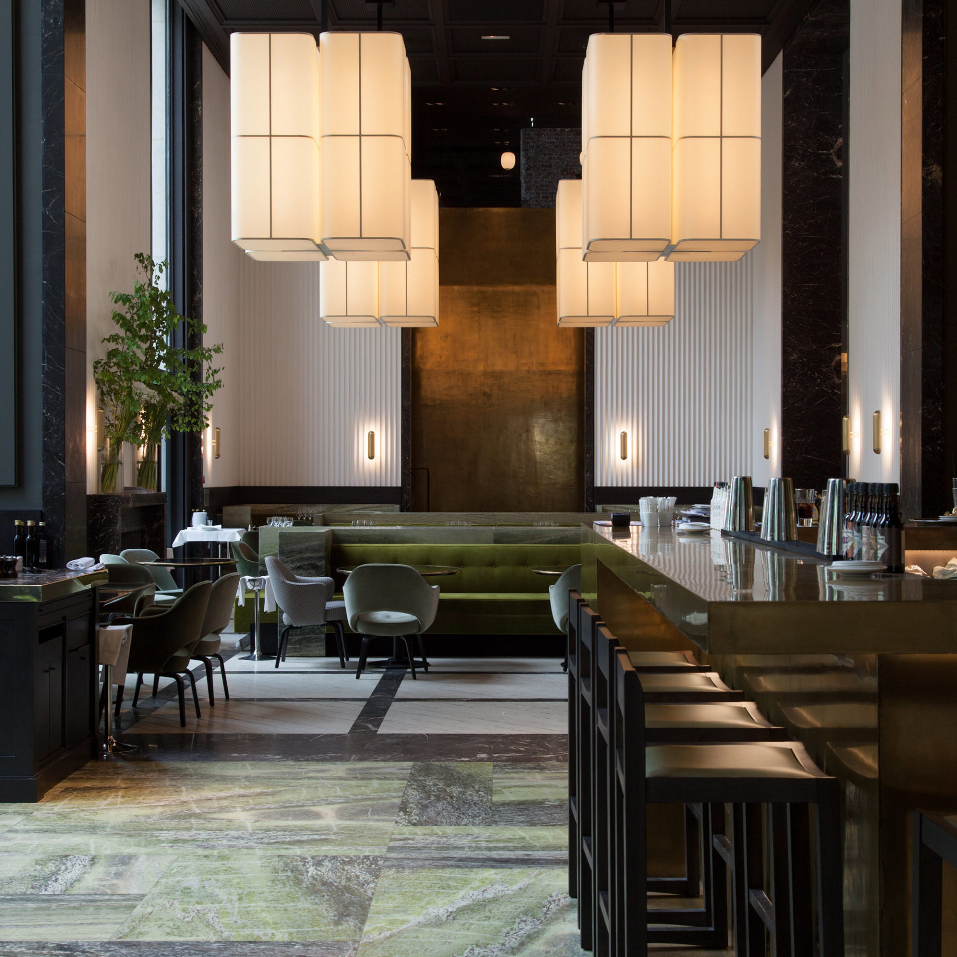 Chandelier Brasilia L designed by Michel Boyer and Sconce Gélule designed by Joseph Dirand for our project restaurant Monsieur Bleu, for Ozone.