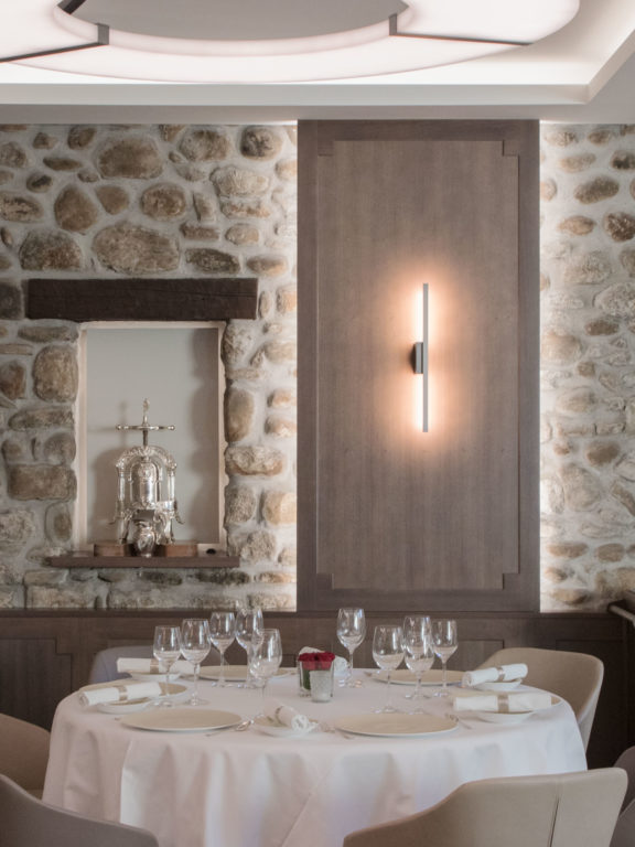 Luxembourg chandelier and Untitled A sconce in a restaurant