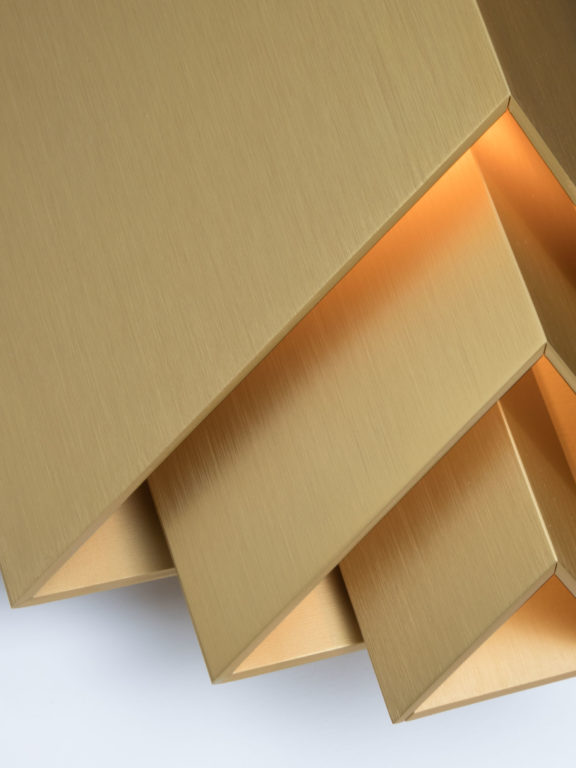 Focus on the details of Joseph Dirand's Phénix sconce for Ozone