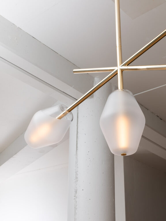 Concorde pendant light by Régis Botta for Ozone in a white setting