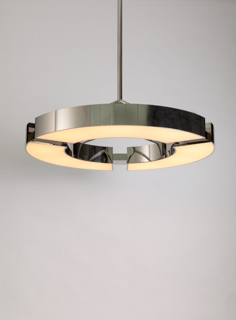 Created by Gounot and Jähnke, the co-founders of Ozone, the circular Classique V chandelier is divided into three sections and emits a soft light thanks to its white paper diffuser