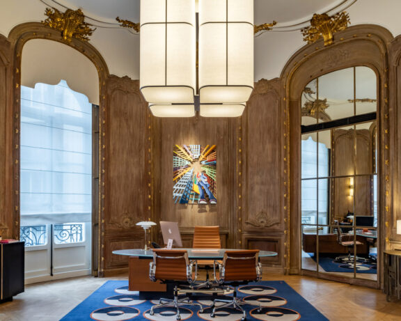 Michel Boyer's Brasilia L chandelier illuminates a large office