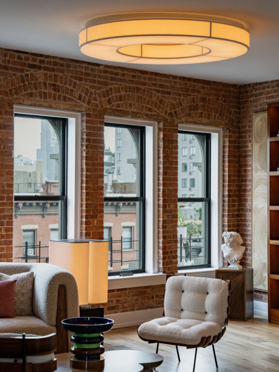 Line C ceiling light by Gounot & Jähnke and Brasilia LH floor lamp by Michel Boyer in a beautiful apartment