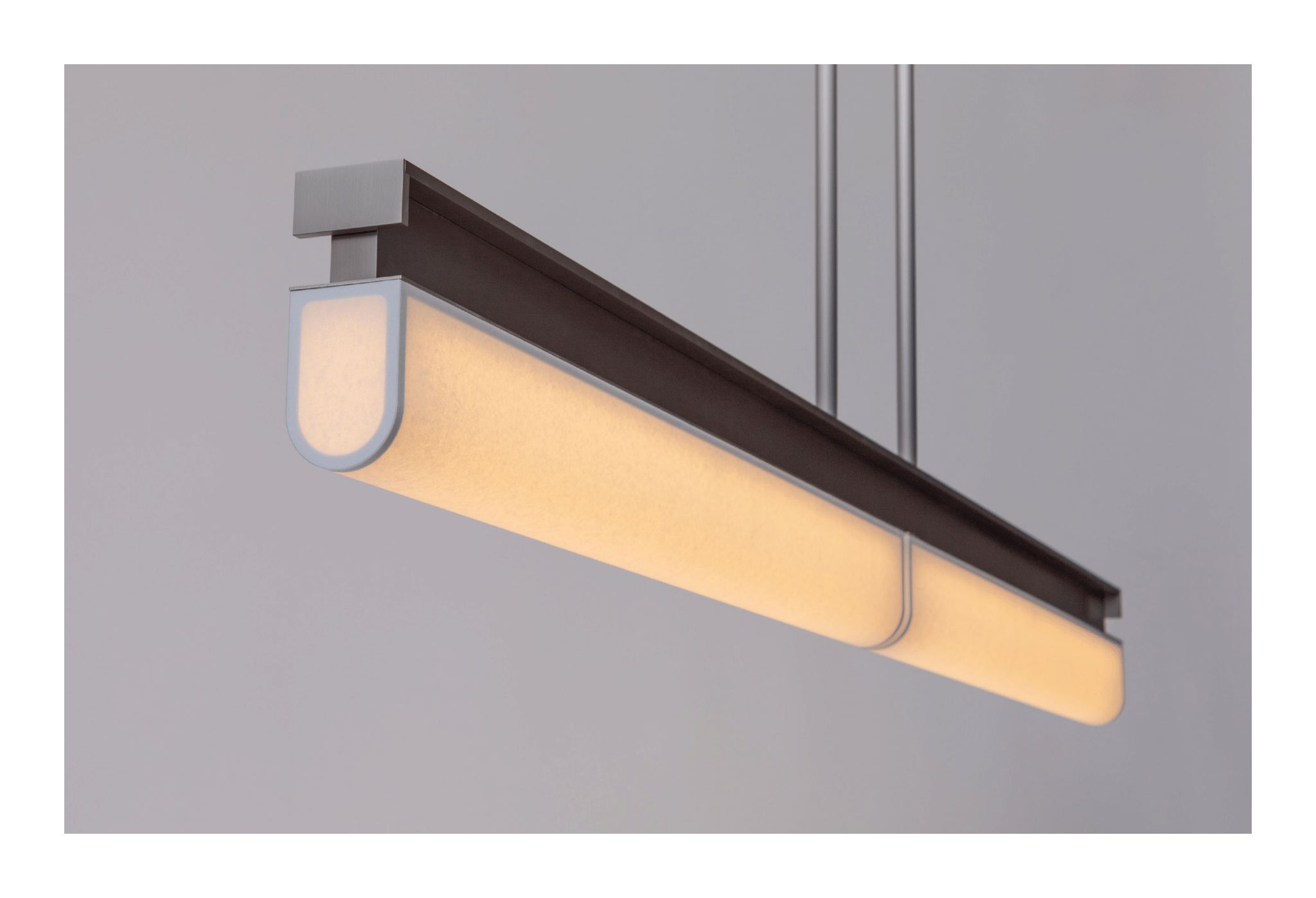 The large Tennessee PL2 pendant lamp in bronze and paper in the Tennessee 2026 booklet