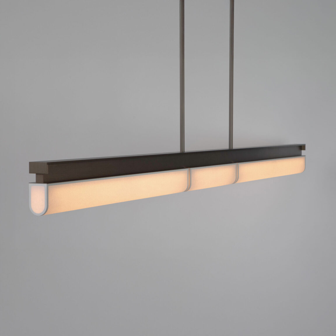 Studio photo of the Tennessee PL3 pendant lamp in matte bronze and white paper